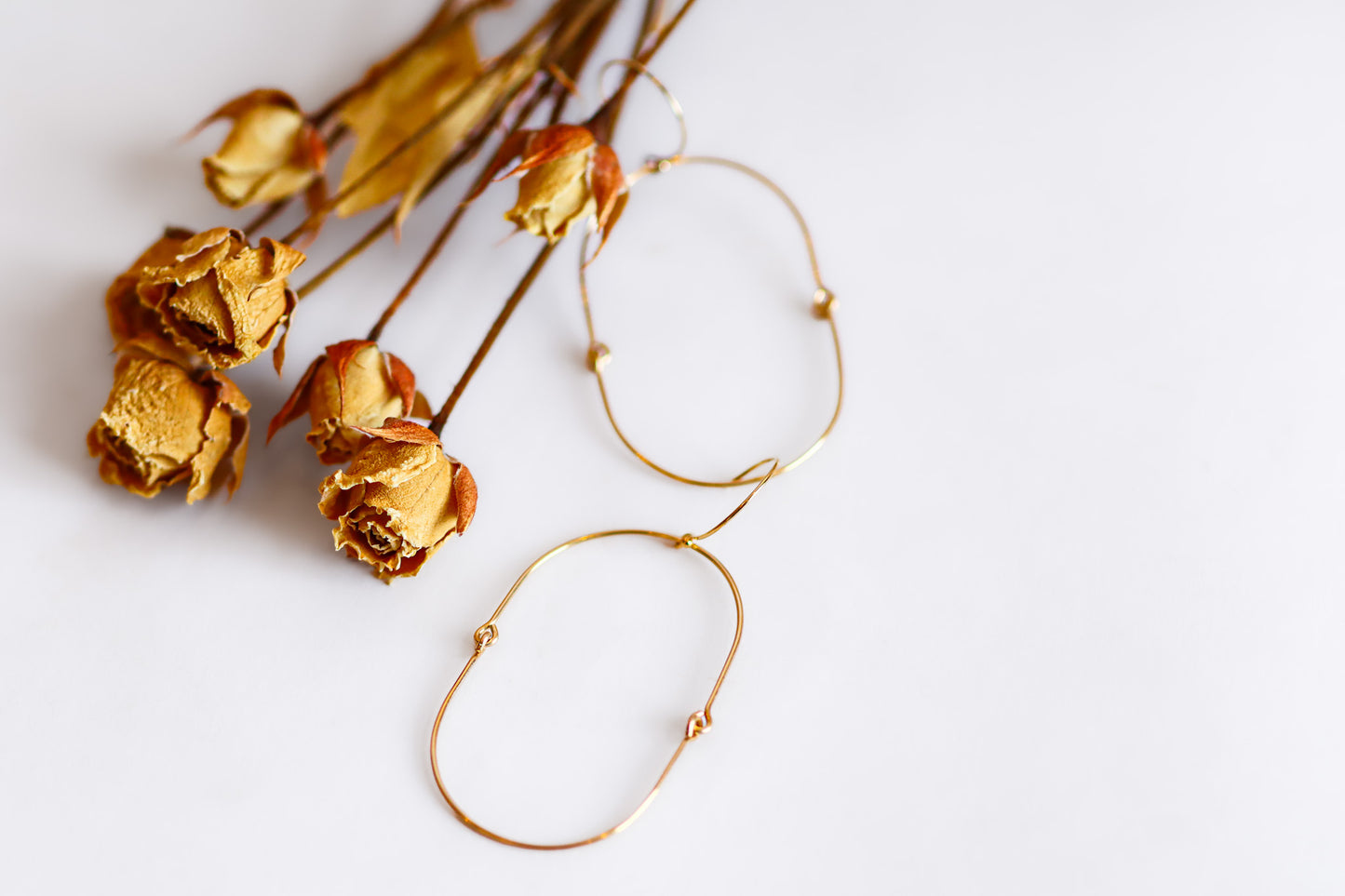 Dtalena Earrings